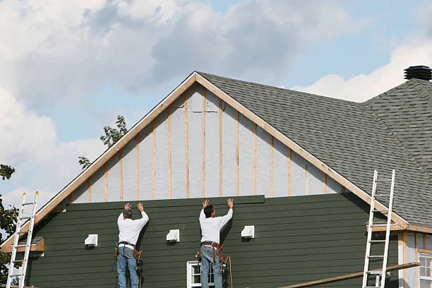 Professional Siding Installation technician working in Round Rock, TX
